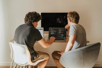 two software developers pair programming